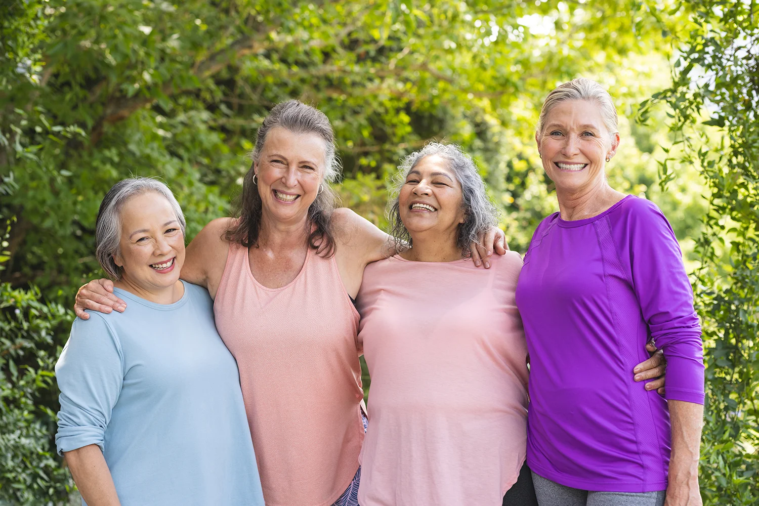 happy women smiling and embracing